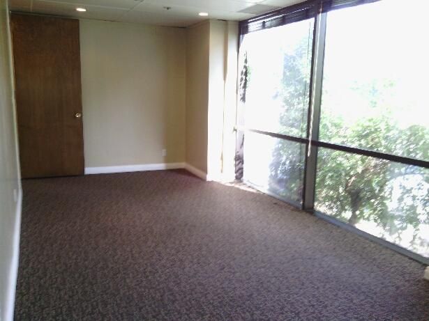 Ground floor office with beautiful tile entry and reception. Several uses.